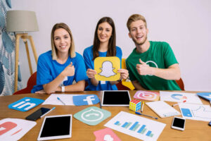 Boys and Girl with social Media Icons