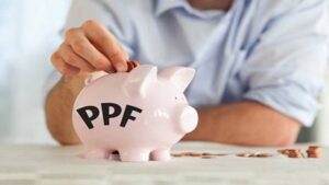 Man Putting coin in the PPF symbolic elephant - PPF Matures