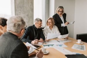 group of people discussing business expansion plan