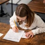 Girl writing an exam
