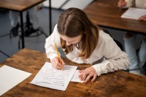 Girl writing an exam
