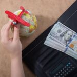 Image demonstrating globe-laptop and currency in dollor