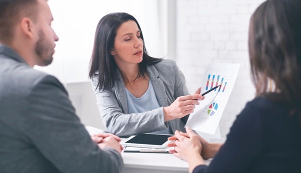 Picture depicting ladies financial planner explaing to their client